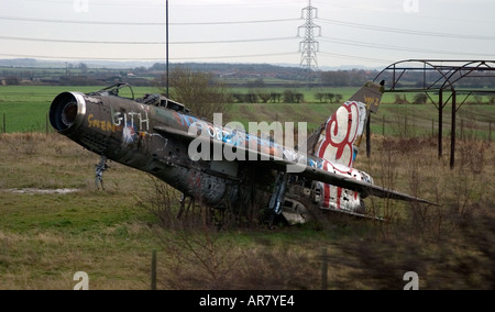Aircraft English Electric Lightning F2A left derelict and covered in Graffiti at Balderton in Nottinghamshire in England Stock Photo