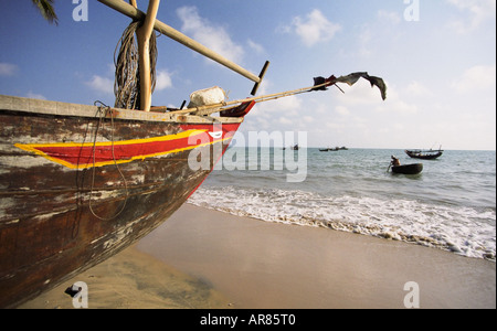 Man In Vietnamese Fishing Boat, Mui Ne Stock Photo