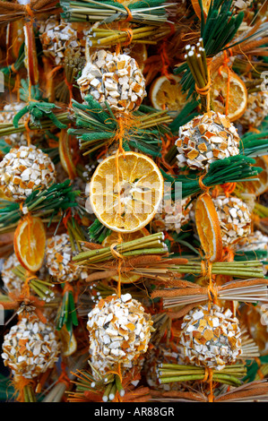 Natural Christmas decorations of dried oranges and cinnamon sticks in a Christmas Market - Salzburg Stock Photo