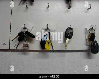 Car keys hanging on a key holder Stock Photo
