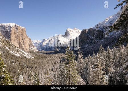 4 February 2008: Yosemite National Park's famous Tunnel View featuring El Capitan and Half Dome after heavy snowfall. Stock Photo