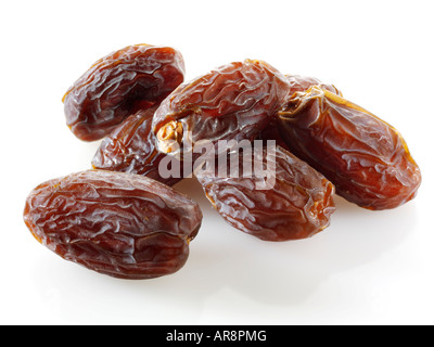 Fresh whole dried dates Fresh whole dates against a white background for cut out Stock Photo
