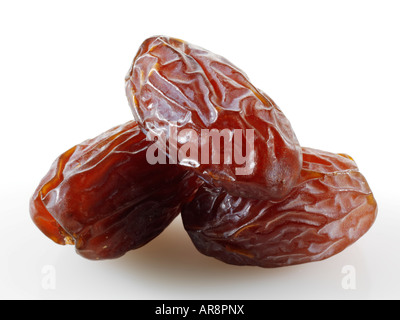 Fresh whole dried dates Fresh whole dates against a white background for cut out Stock Photo