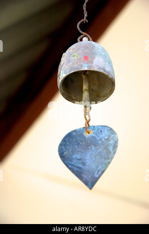 Bell wind chimes hanging from a temple roof at Wat Phra Thong on Phuket Island, Thailand, UK Stock Photo