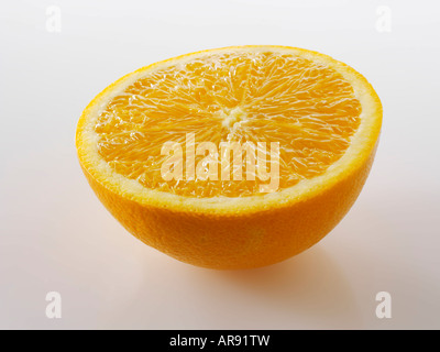Half an orange slice  on a white background as a cut out Stock Photo