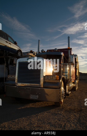 trailer convoy Juganaut haulage freight road train roadtrain large huge big americana chrome grill diesel trucking trucker long Stock Photo