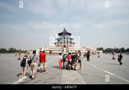 Tourists in front of the Hall of Prayer for Good Harvests at the Temple of Heaven complex in Beijing, China. Stock Photo