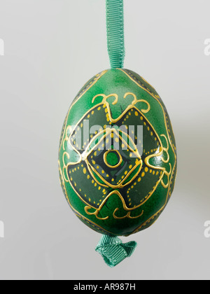 traditional  festive decorated  Christmas  bauble in green and gold Stock Photo