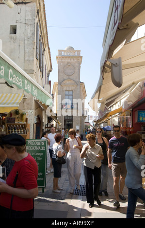 pedestrian street in Saintes Marie de la Mer with Baroncelli museum in the background Provence Camargue France Stock Photo