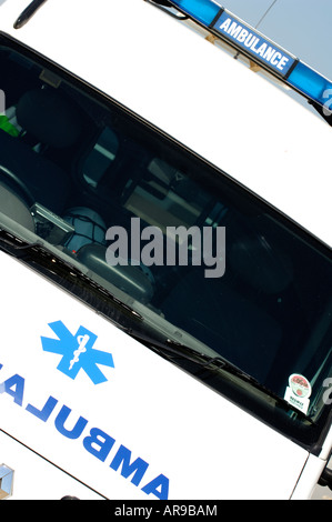 a front view of an ambulance emergency vehicle on an angle making a dynamic viewpoint Stock Photo