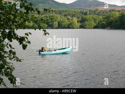 Fisherman in boat on Loch Faskally Pitlochry Scotland UK Stock Photo