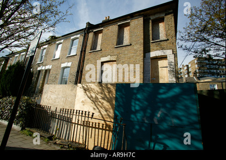 boarded-up empty end-of-terrace house in north  london Stock Photo