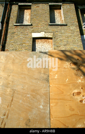 boarded-up empty house in north london Stock Photo