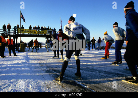 The Elfstedentocht 200 Kilometer, Kilometre, ice skating race along the frozen canals of Friesland in Holland. Seen here in 1986 Stock Photo