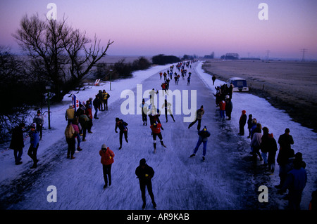 The Elfstedentocht 200 Kilometer, Kilometre, ice skating race along the frozen canals of Friesland in Holland. Seen here in 1986 Stock Photo