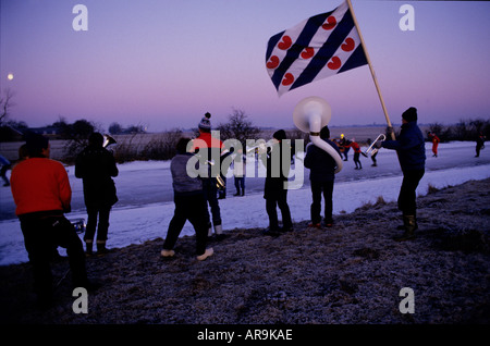 The Elfstedentocht 200 Kilometer, Kilometre, ice skating race along the frozen canals of Friesland in Holland. Seen here in 1986 Stock Photo