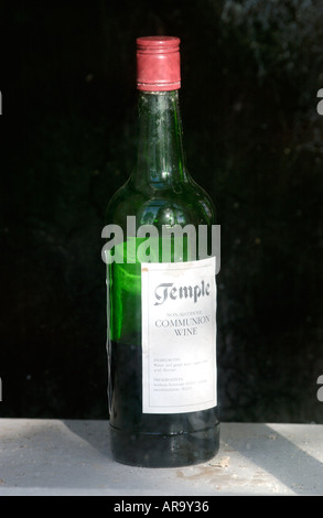 Old communion wine bottle in window of closed Welsh Bethesda Chapel at Brechfa near Brecon Powys Wales UK dated 1802 Stock Photo