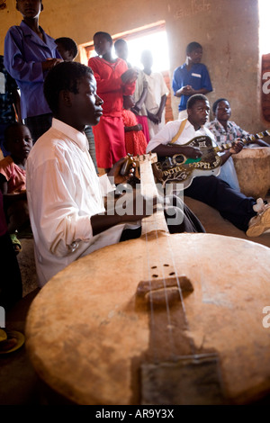 Musicians from Malawi rehearsing at a village community centre in ...