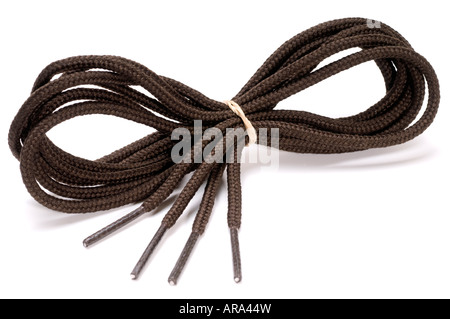 A pair of long brown "boot laces" Stock Photo
