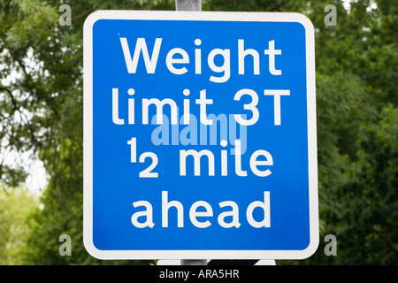Square blue weight limit 3 tonnes half a mile ahead road sign Stock Photo