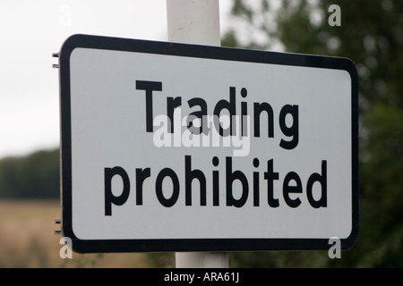 Trading prohibited road sign in roadside layby Stock Photo