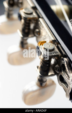 Tuning pegs of a guitar Stock Photo