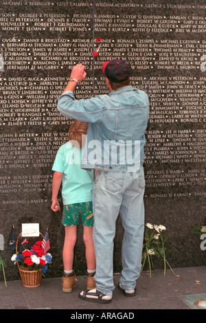 Father and son 40 and 9 at Minnesota Vietnam Veterans Memorial Wall on Memorial Day. State Capitol St Paul Minnesota MN USA Stock Photo