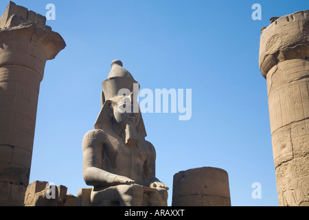 Statue of Ramses II in summer sun sunshine Karnak Temple UNESCO World Heritage Site Luxor Egypt North Africa Stock Photo