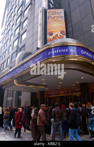 Theater lovers attend a matinee performance of the hit musical the Color Purple Broadway at the Broadway Theatre in NYC Stock Photo