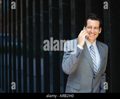 Businessman Using Cellular Phone Stock Photo