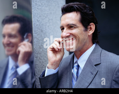 Businessman Talking on Headset Stock Photo