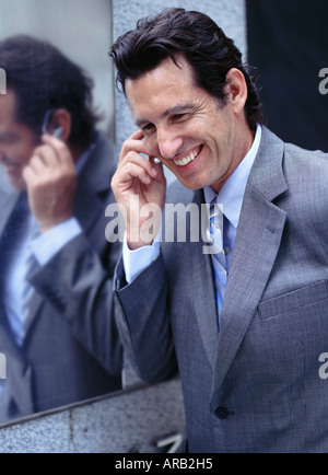 Businessman Talking on Headset Stock Photo