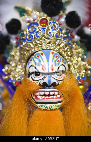 Intricately carved face of hand puppet, Jinshow Zhuang puppet store and museum, Quanzhou, Fujian Province, China Stock Photo