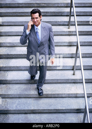 Portrait of Businessman Using Cellular Telephone Stock Photo