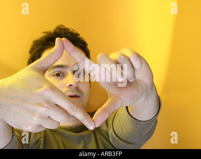 nice guy; isolated on orange background Stock Photo