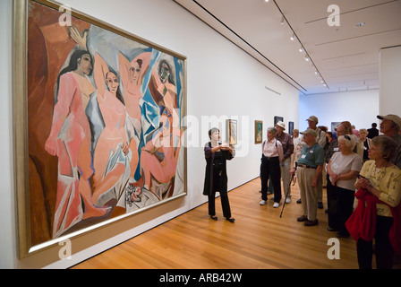 lecturer in front of Les Demoiselles d'Avignon by Picasso, The Museum of Modern Art, New York Stock Photo