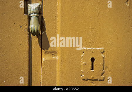 Door detail in shape of hand, the Judería Córdoba Andalucia Spain Stock Photo