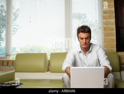 Man using Laptop Computer Stock Photo
