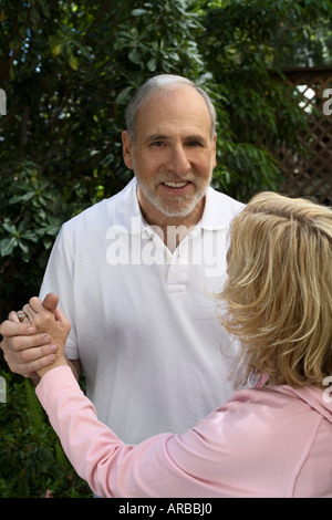 Couple Dancing Outdoors Stock Photo