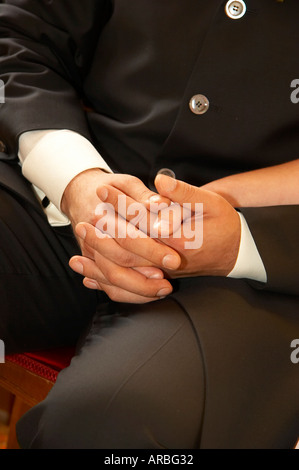 bridal couple holding hands Stock Photo