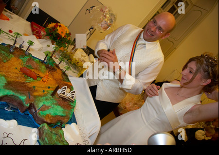 cutting the wedding cake Stock Photo