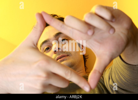 nice guy; isolated on orange background Stock Photo