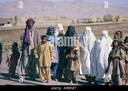 Group of Sibi men, veiled women and children, Baluchistan, Pakistan, Asia Stock Photo