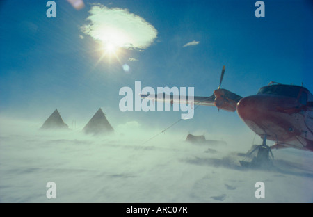 Aircraft on the ground in a blizzard, Antarctica Stock Photo