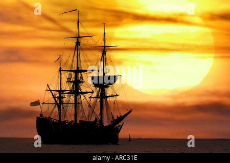 Replica of James Cook's ship Bark Endeavour  Solent Isle of Wight England huge sunset, gaffer, Stock Photo
