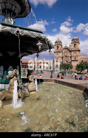 Fountain and the Christian cathedral beyond, Cuzco Ciity (Cusco), UNESCO World Heritage Site, Peru, South America Stock Photo