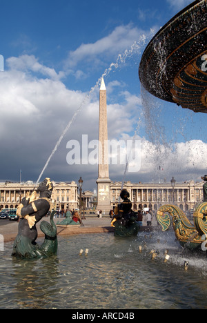 Paris fountain Place de la Concorde with Obelisk beyond Stock Photo