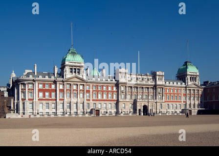 Admiralty Extension a red brick white stone building green roofs fronting the gravel Horse Guards Parade Ground  Westminster London England UK Stock Photo