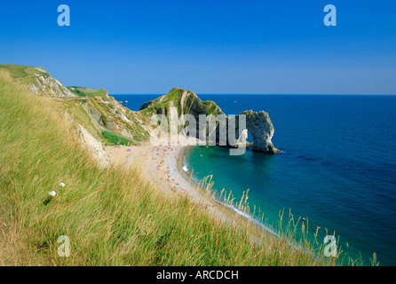 View from coastal path of Durdle Door, arch of Purbeck limestone, near West Lulworth, Dorset, England, UK Stock Photo