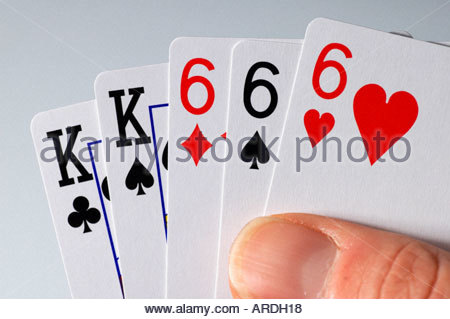 Three of a kind in poker Stock Photo